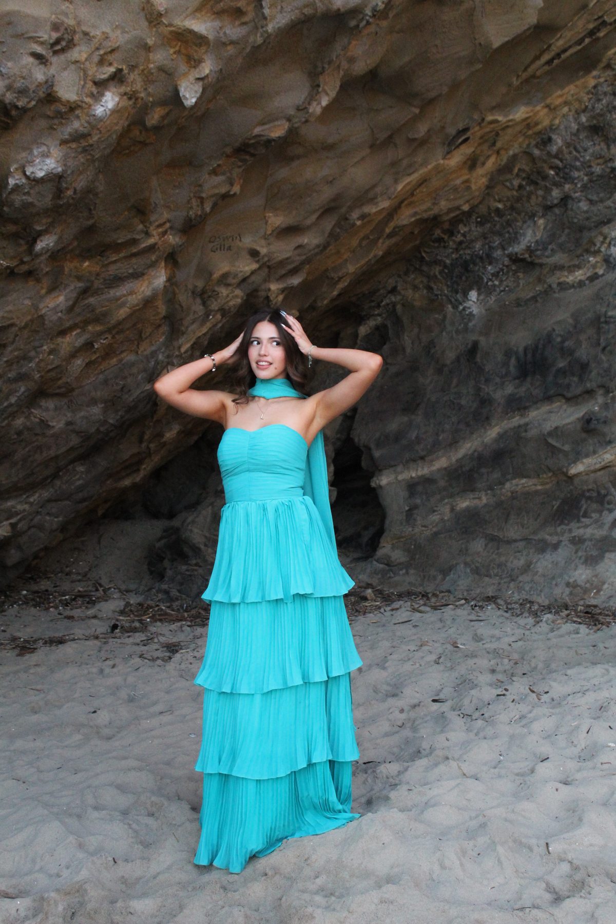 Prom — teal gown at beach cave