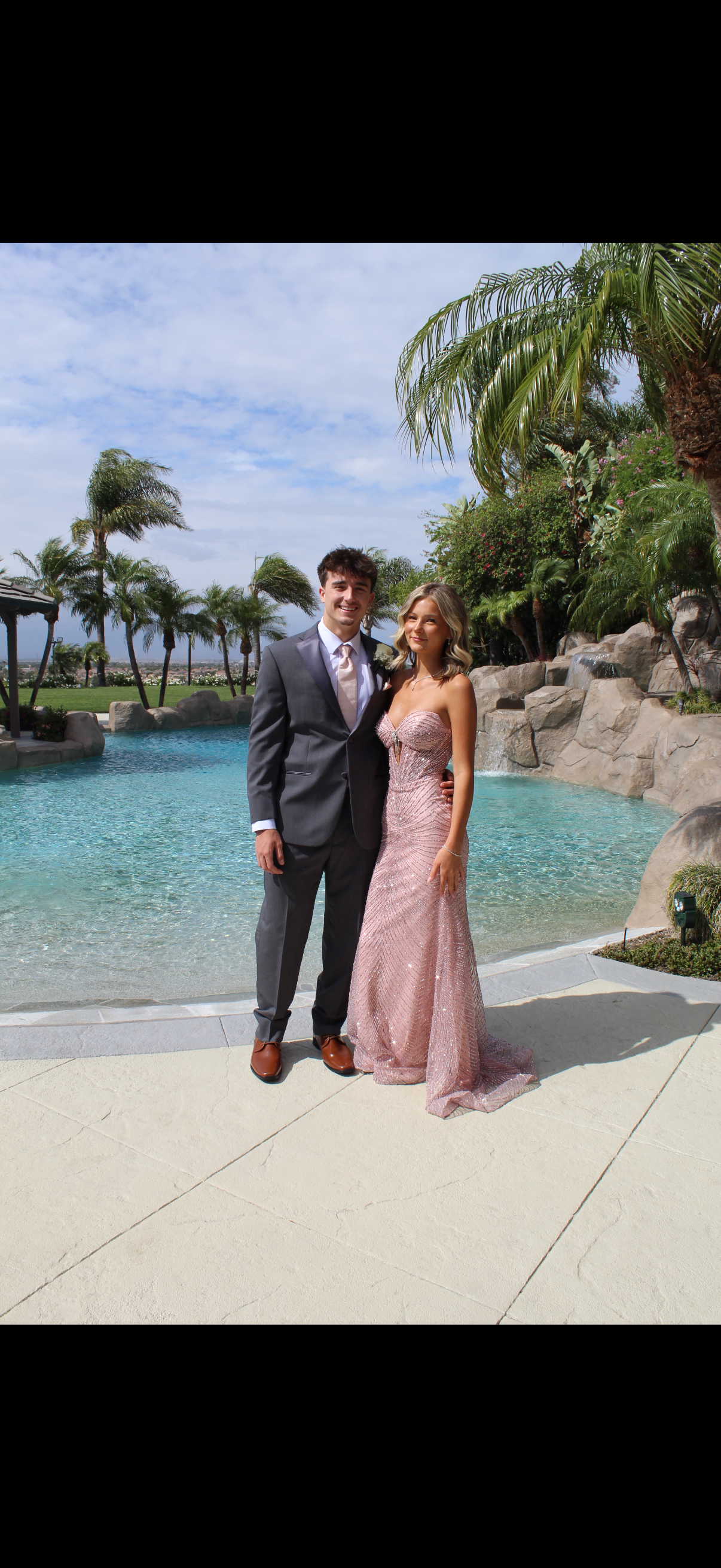 Prom couple at pool